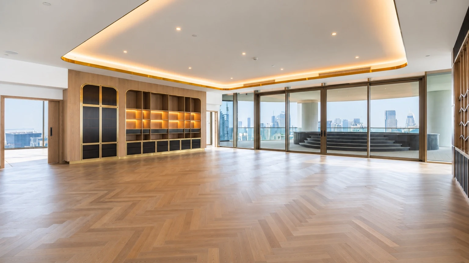 Full-floor penthouse living room and kitchen