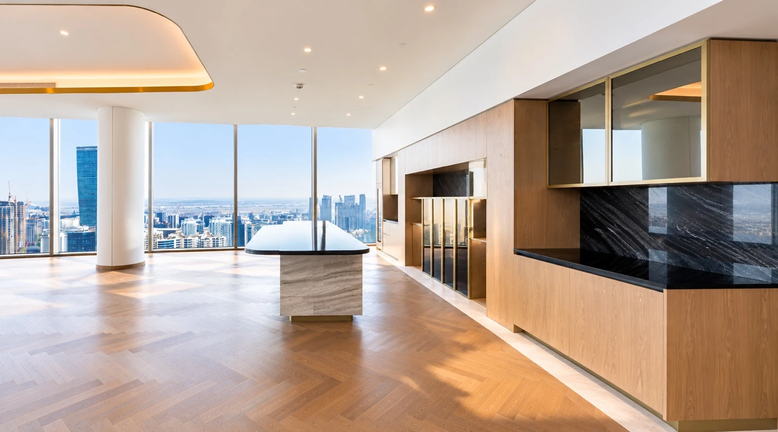 Full-floor penthouse kitchen and living area